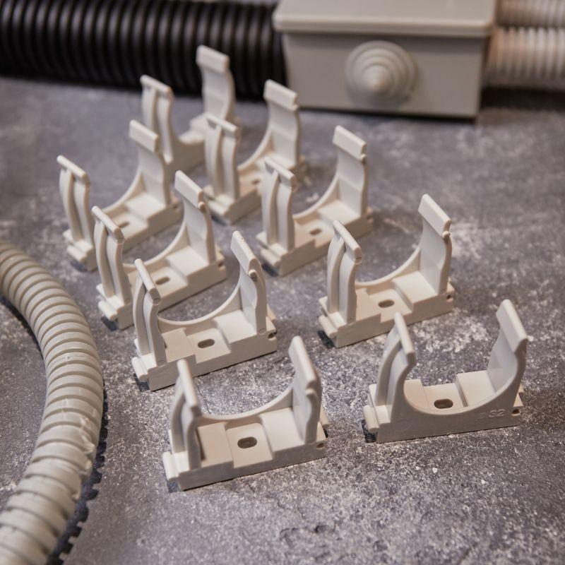  Держатель для труб (клипса) d32мм для монтажн. пистолета сер. Rexant 28-0432-1 фото в каталоге от BTSprom.by