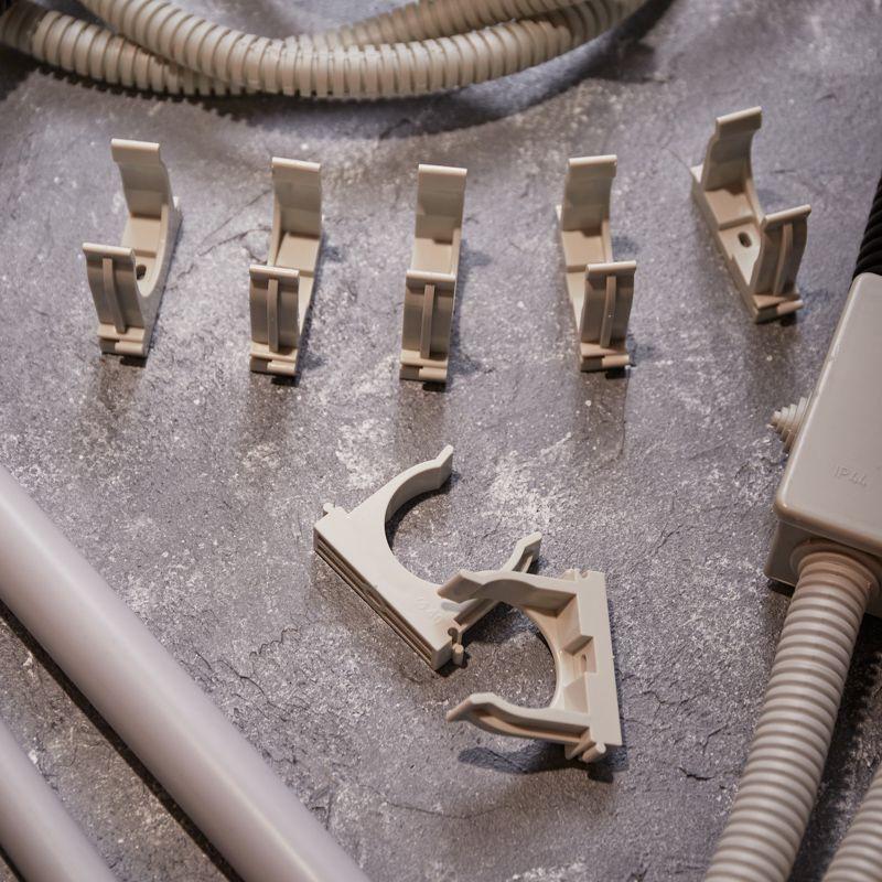  Держатель для труб (клипса) d40мм для монтажн. пистолета сер. Rexant 28-0440-1 фото в каталоге от BTSprom.by