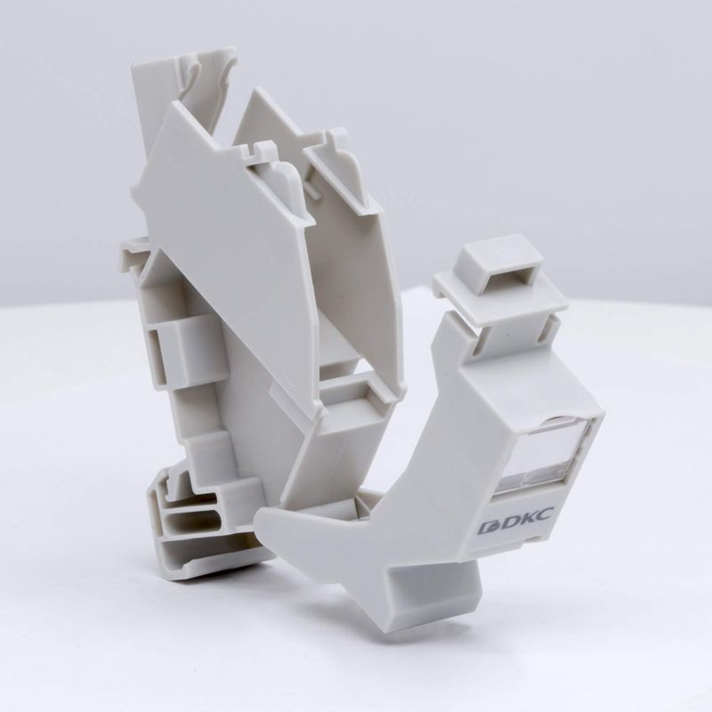  Адаптер на DIN рейку для модулей Keystone (для модулей форм-фактора S19) DKC RNW1DIN фото в каталоге от BTSprom.by