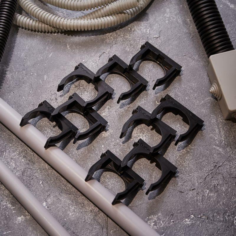  Держатель для труб (клипса) d50мм для монтажн. пистолета черн. Rexant 28-0450-2 фото в каталоге от BTSprom.by