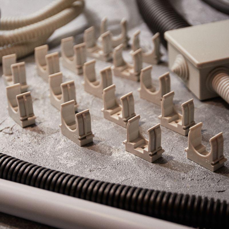  Держатель для труб (клипса) d25мм для монтажн. пистолета сер. Rexant 28-0425-1 фото в каталоге от BTSprom.by