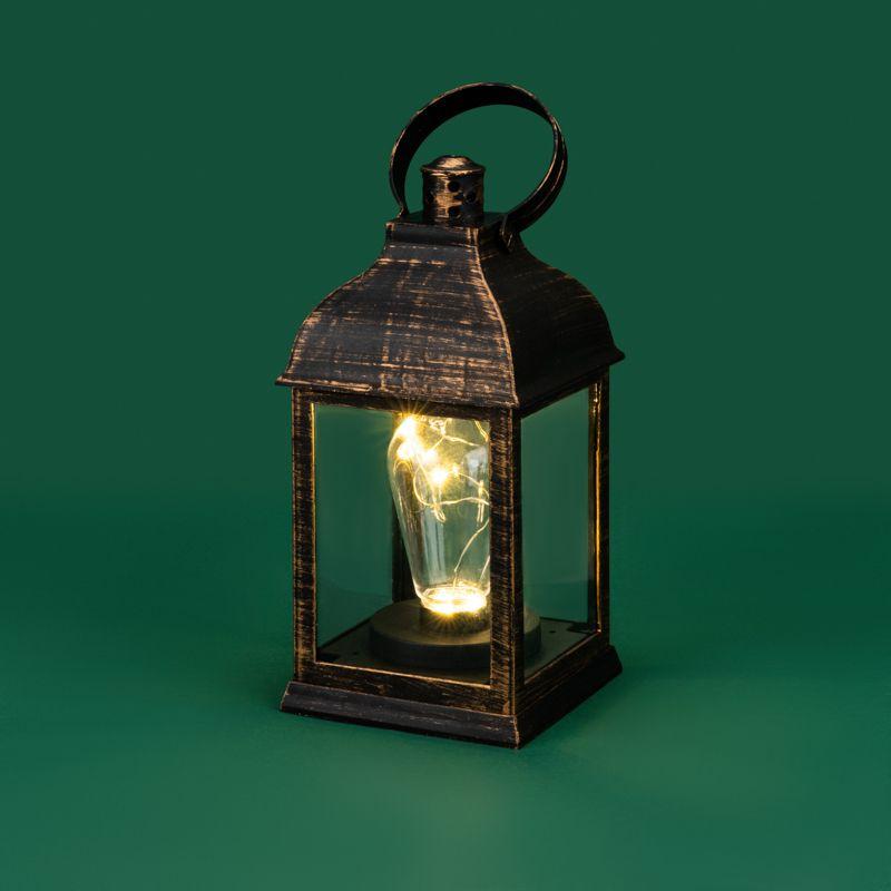 Фонарь декоративный 10.5х10.5х22.5см тепл. бел. со свечкой корпус бронз. Neon-Night 513-053 фото в каталоге от BTSprom.by  Фонарь декоративный 10.5х10.5х22.5см тепл. бел. со свечкой корпус бронз. Neon-Night 513-053 фото в каталоге от BTSprom.by